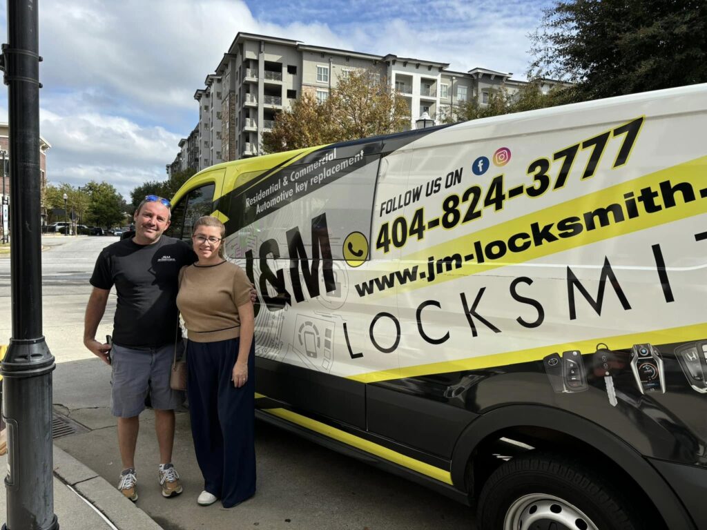 Eugene Rozhavsky and team in front of J&M Locksmith branded service van, Atlanta